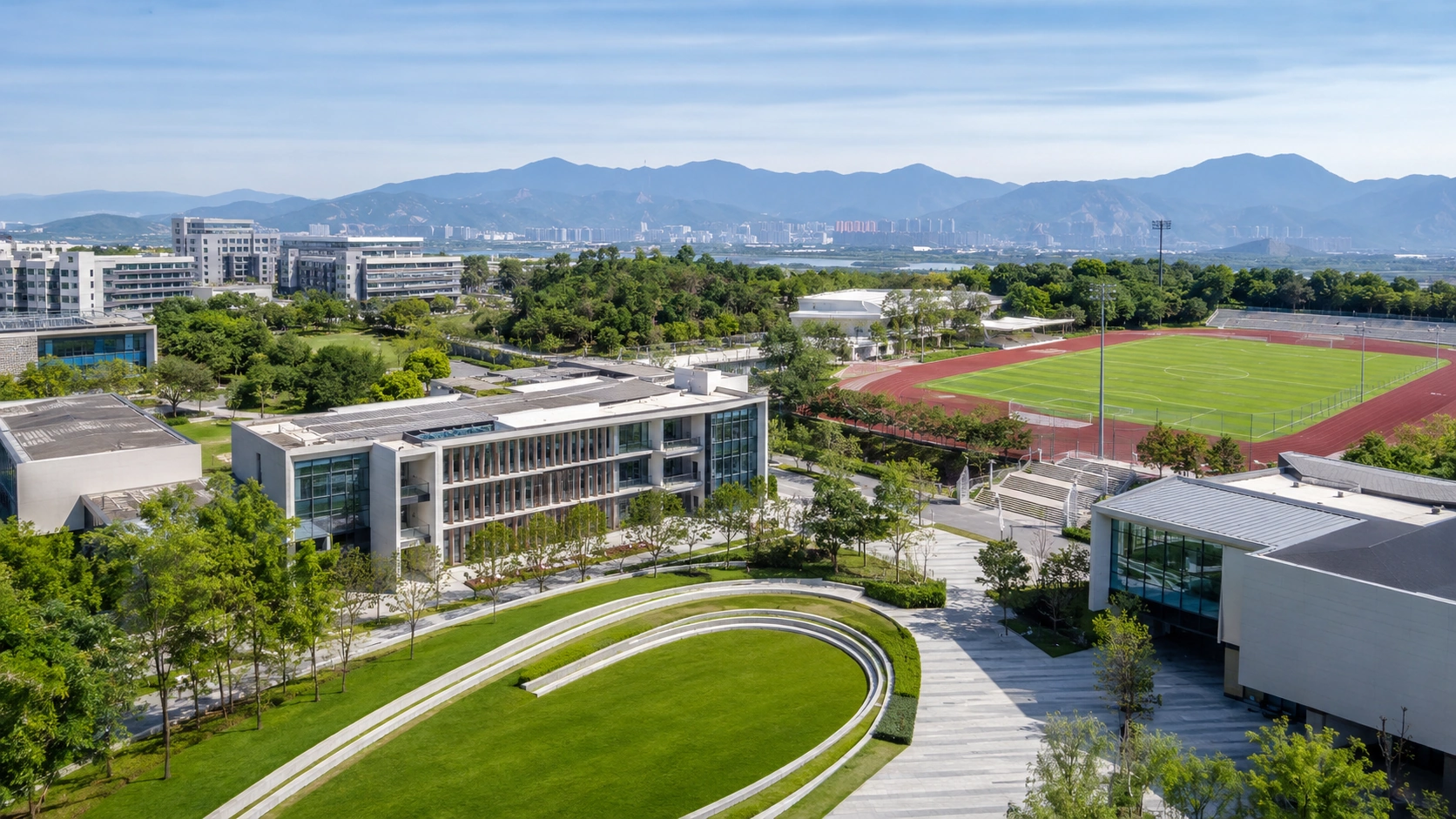 Aerial view of Aurevia campus buildings, green spaces and sports grounds